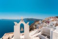 Blue dome and white Church bell tower in the village of Oia in Santorini, Greece Royalty Free Stock Photo