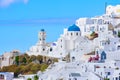 A blue domed church with bell tower in Imerovigli village, Santorini, Greece Royalty Free Stock Photo