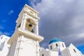 A blue domed church with bell tower in Imerovigli village, Santorini, Greece Royalty Free Stock Photo