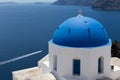 Blue domed churches on the Caldera at Oia on the Greek Island of Royalty Free Stock Photo