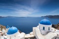 Blue domed churches on the Caldera at Oia on the Greek Island of Royalty Free Stock Photo