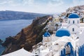 Blue domes and bell tower of churches in Oia, Santorini, Greece. Royalty Free Stock Photo