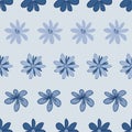 Blue doodle floral seamless pattern with pastel cute flowers. Horizontal repeat background. Royalty Free Stock Photo