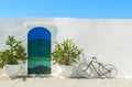 The Blue door with cactus and the traditional white walls in the town of Ostuni (Puglia - Italy Royalty Free Stock Photo