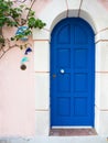 Blue door of Greek houses in the village on the island of Kefalonia in the Ionian Sea in Greece Royalty Free Stock Photo