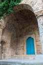 Blue door of a monastery, the color of the wood playing nicely w Royalty Free Stock Photo