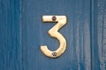 Blue door number 3 Royalty Free Stock Photo