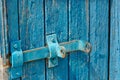 Blue Door of old boards with a latch Royalty Free Stock Photo