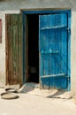 Blue Door of old boards with a latch Royalty Free Stock Photo