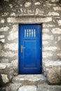 Blue door in old stone house Royalty Free Stock Photo