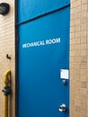 Blue door to a mechanical room