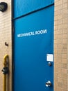 Blue door to a mechanical room Royalty Free Stock Photo