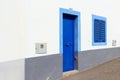 Blue door window shutters white house, Canary islands, Spain Royalty Free Stock Photo