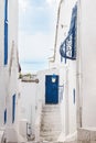 Blue door and windows in white Arab courtyard Tunisia Royalty Free Stock Photo