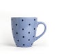 Blue dotted tea mug isolated on white background