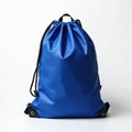Blue drawstring backpack sits ready for use. This versatile bag suits gym, school, or travel needs. It offers simple, practical Royalty Free Stock Photo