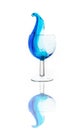 Blue drink in a glass. Spilling liquid. A drink glass. Royalty Free Stock Photo