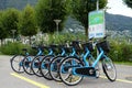 Blue E-bikes used in sharing system activated by card or mobile phone in cities and towns by Velospot company.