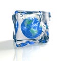 Blue earth globe in ice cube