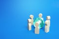 Blue earth globe is surrounded by people. Global communication, cooperation and collaboration. Diplomacy and negotiation process. Royalty Free Stock Photo