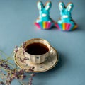 Blue easter bunny gingerbread cookie with a cup of coffee Royalty Free Stock Photo