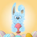 Blue Easter bunny is holding painted and decorated egg. Vector illustration. Royalty Free Stock Photo