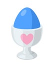 Blue Easter egg in egg cup with a heart. Decorative tableware for Easter eggs. Vector illustration Isolated on white Royalty Free Stock Photo