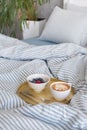 Blue ecologycal linen on bed in modern home interior. Daylight Royalty Free Stock Photo
