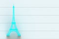 Blue eiffel tower on white wooden board