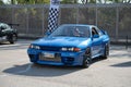 blue eighth-generation Nissan Skyline GT R32 at a Japanese sports car meet. Royalty Free Stock Photo