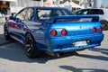 blue eighth-generation Nissan Skyline GT R32 at a Japanese sports car meet. Royalty Free Stock Photo