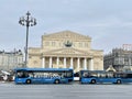 Moscow, Russia, February, 20, 2024. Blue electric bus in the Theater Passage in front of the Bolshoi Theater