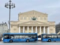 Moscow, Russia, February, 20, 2024. Blue electric bus in the Theater Passage in front of the Bolshoi Theater