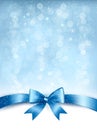 Blue elegant holiday background with gift bow and ribbon. Royalty Free Stock Photo