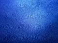 Blue embossed faux leather for textures and backgrounds.