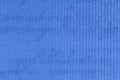 Blue embossed plastic texture background, close up