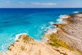 Blue emerald sea water with large stones beach. Rocky shore transparent turquoise bottom Malta Royalty Free Stock Photo