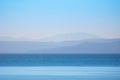 Blue empty sea with hills on background, Grado - Italy Royalty Free Stock Photo