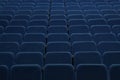 Blue empty seats in the hall are prepared for participants of mass events. Organization and holding of mass events, conferences or Royalty Free Stock Photo