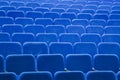 Blue empty seats in the hall are prepared for participants of mass events. Organization and holding of mass events, conferences or Royalty Free Stock Photo