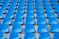 Blue empty stadium seats in arena Royalty Free Stock Photo