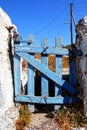 Blue entrance gate in Santorini, Greece Royalty Free Stock Photo