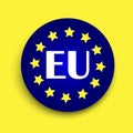 Blue euro union button on a yellow background. The emblem of the European Union. EU symbol. Stock image Royalty Free Stock Photo