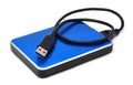 Blue external hard drive on white background Royalty Free Stock Photo