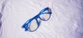 Blue Eye Glasses Isolated on White. Royalty Free Stock Photo