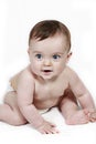 Blue-eyed baby sitting Royalty Free Stock Photo