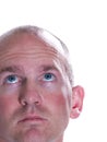 Blue Eyed Bald Man looking up Royalty Free Stock Photo