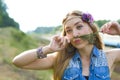 Horizontal closeup portrait of a charming hippie on nature background