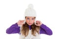 Blue eyes child kid girl with white winter cap fur Royalty Free Stock Photo