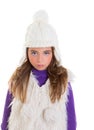 Blue eyes child kid girl with white winter cap fur